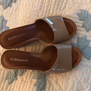 Patten leather wedge